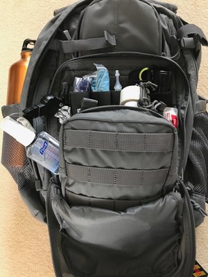 Front pocket with first aid pouch